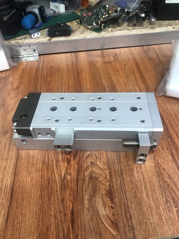Stock, SMC, EMXS25-100R, Slide Table Cylinder, Used